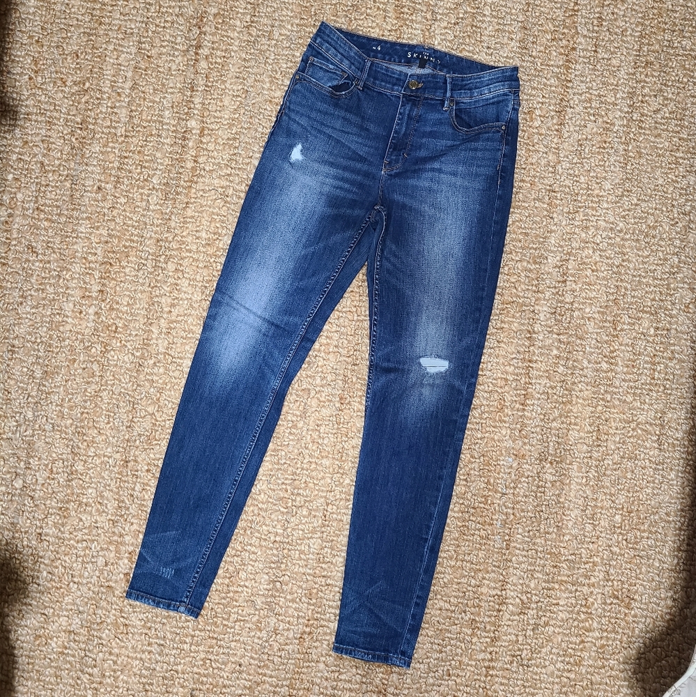 White House Black Market Size 4 ankle-cropped jeans, worn with no major flaws